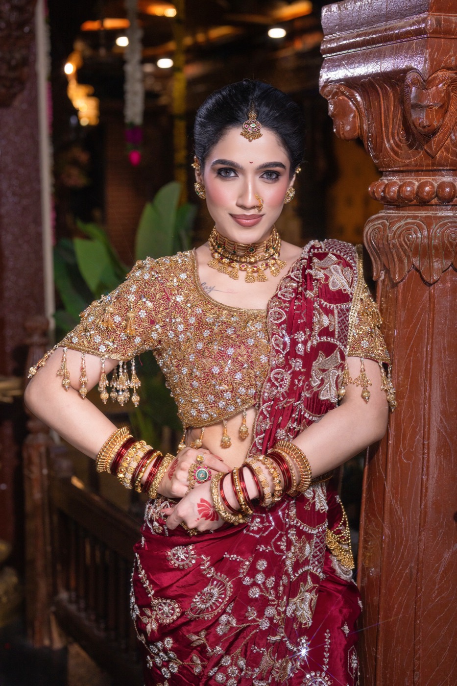 Gold and maroon bridal look